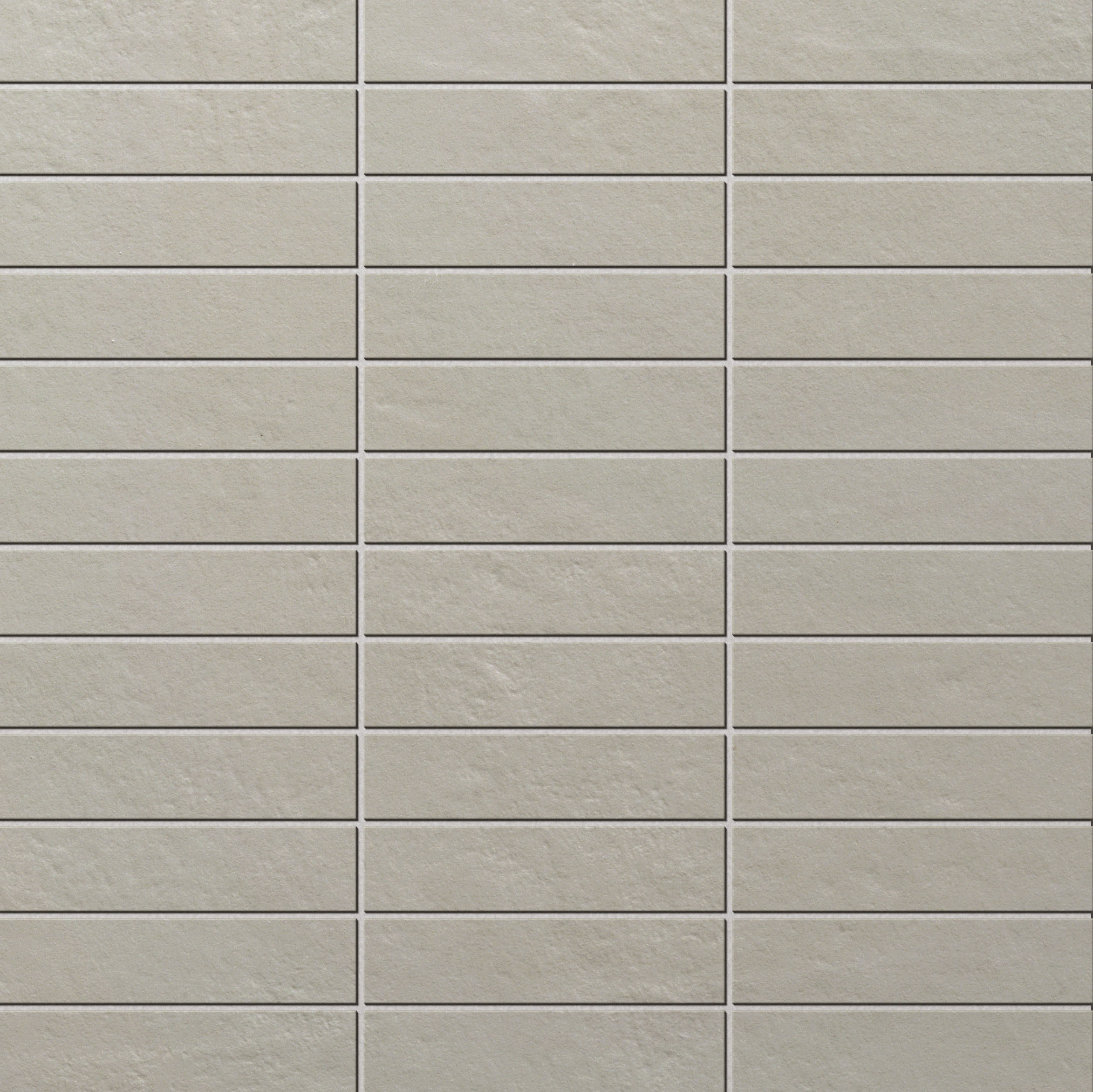 Hochwertige, beige-graue Riemchenfliesen mit matter Oberfläche.