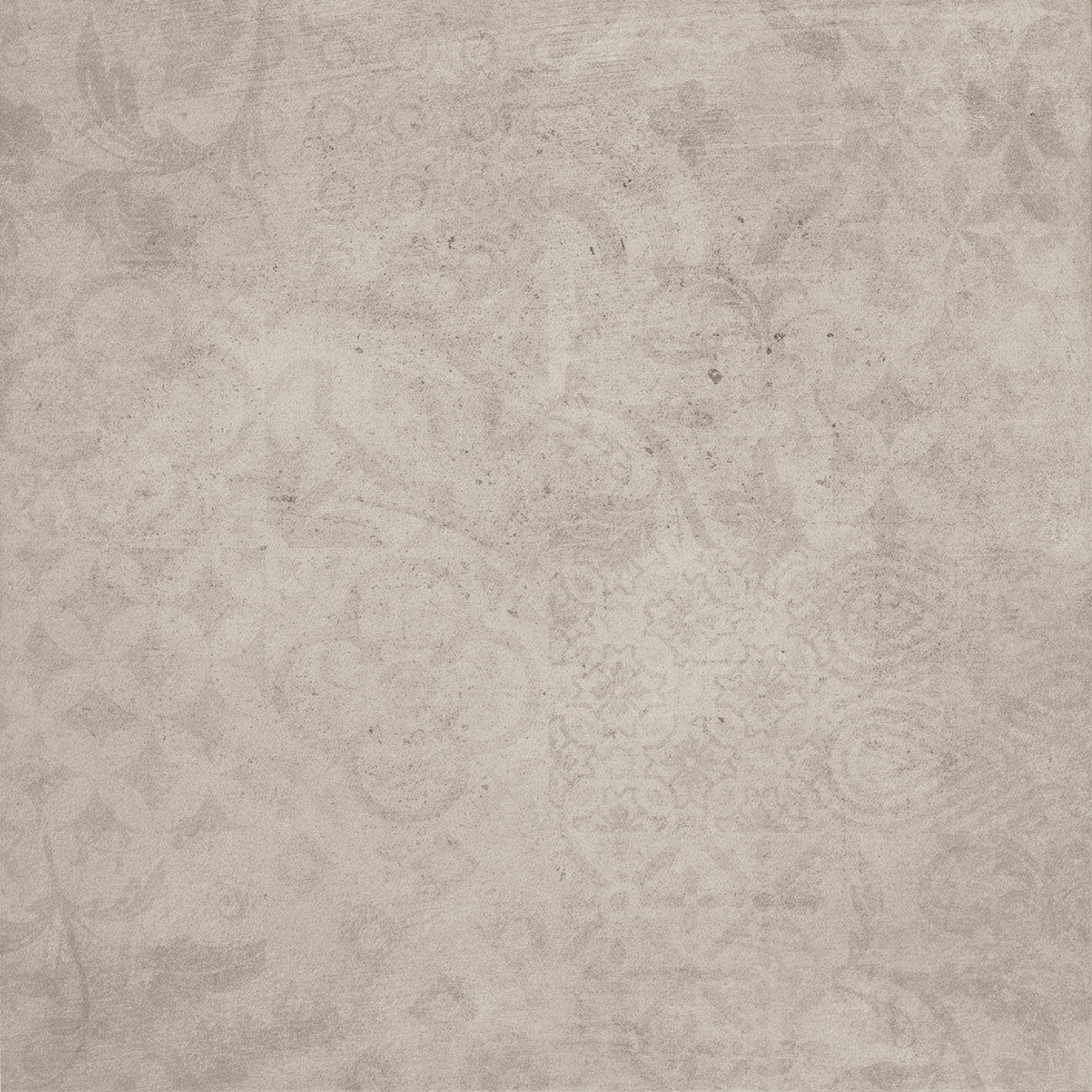 Weave Urban Ivory: Graubeige Fliese mit verblassten, ornamentalen Patchwork-Mustern.